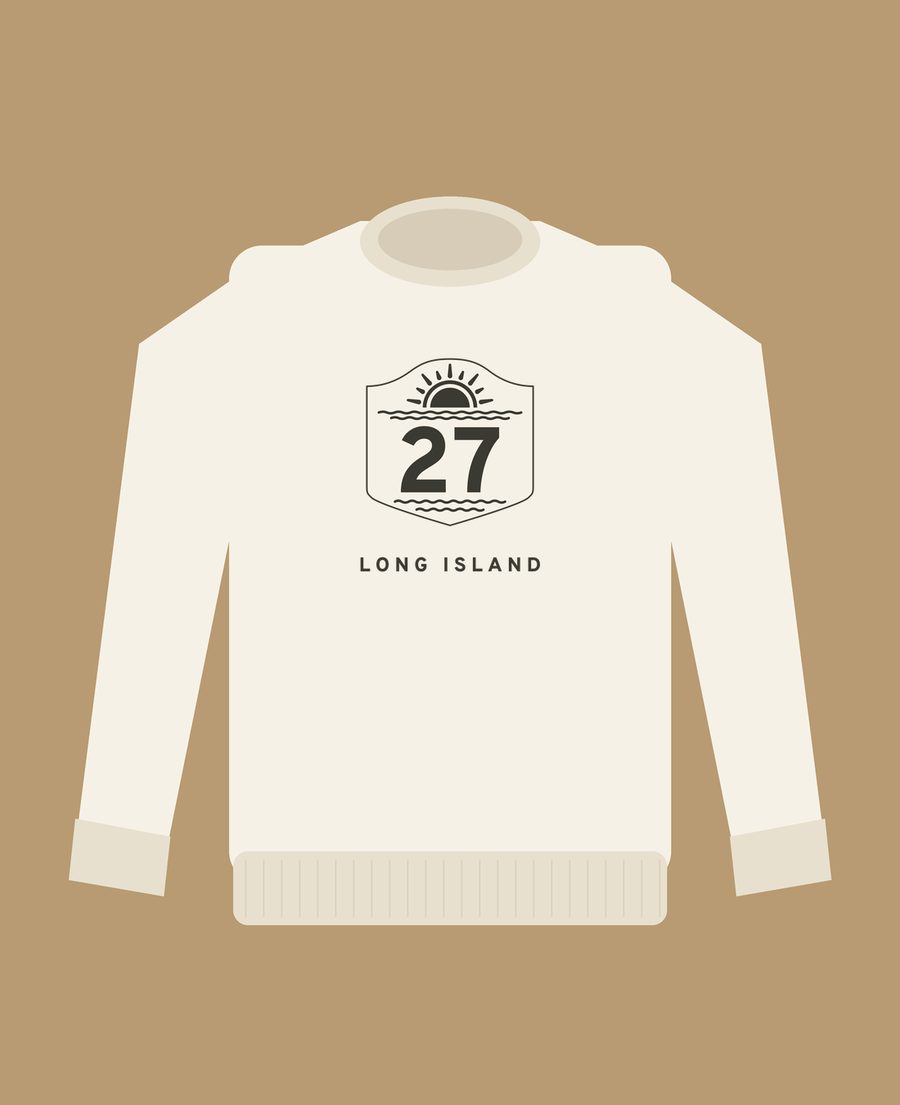 Illustrated mockup of an off-white crewneck sweatshirt with the Long Island 27 shield on the chest, on a driftwood tan background.